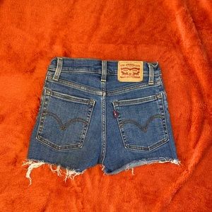 Levi’s high rise, dark wash women’s shorts.